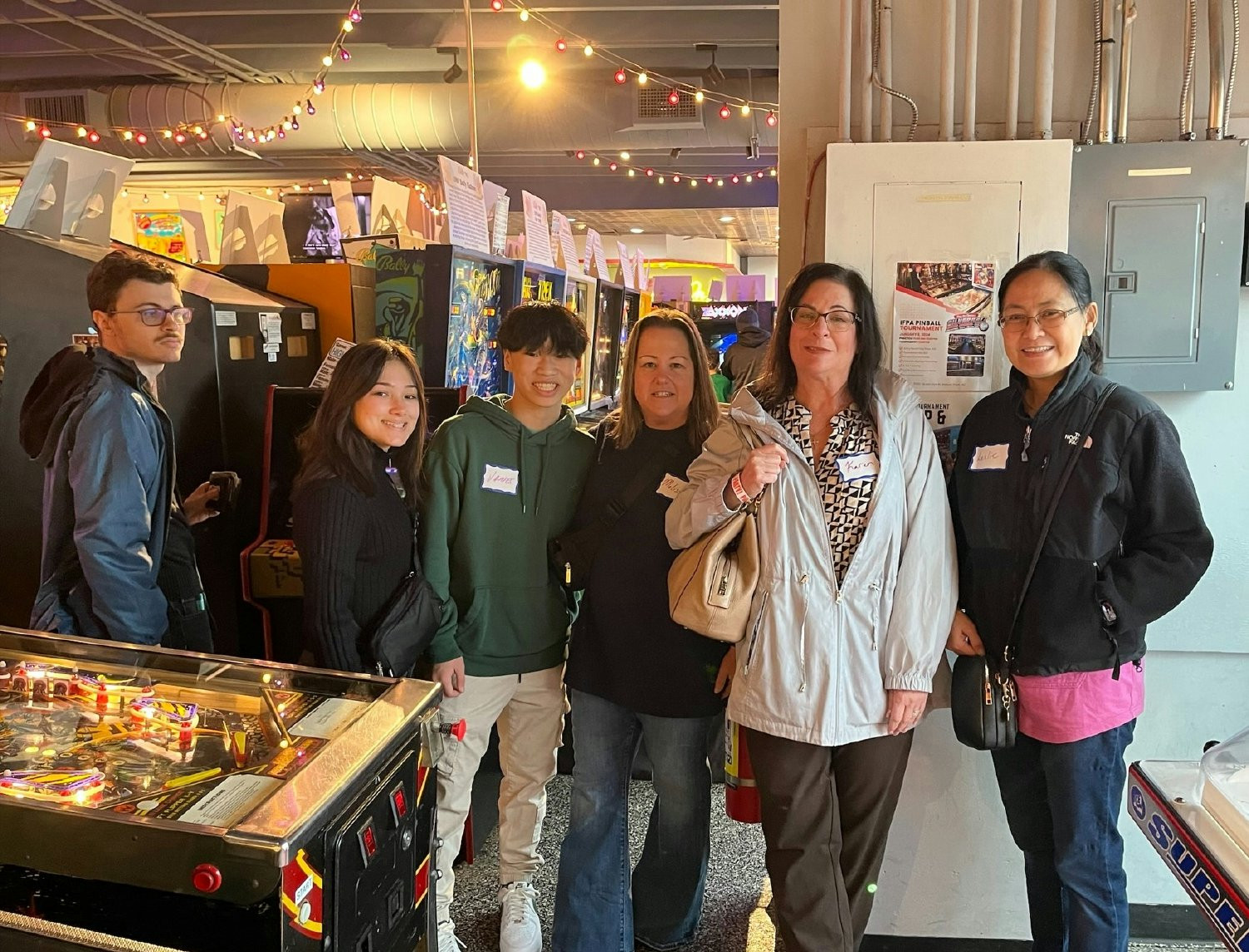 Our team held a winter party at a local arcade for our families, friends, and our community.