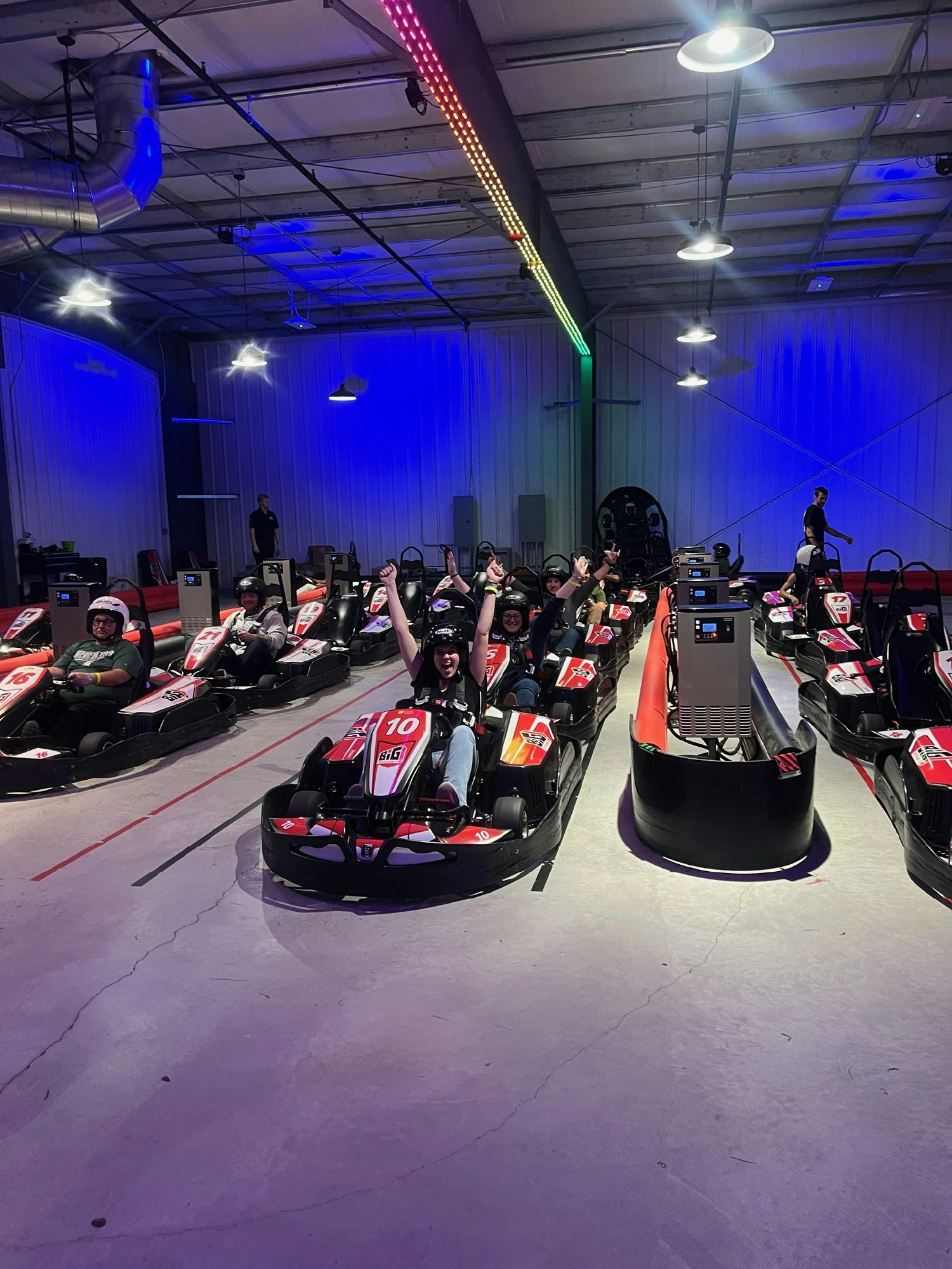 A group outing at an arcade and gaming facility.  Go karting was group favorite.