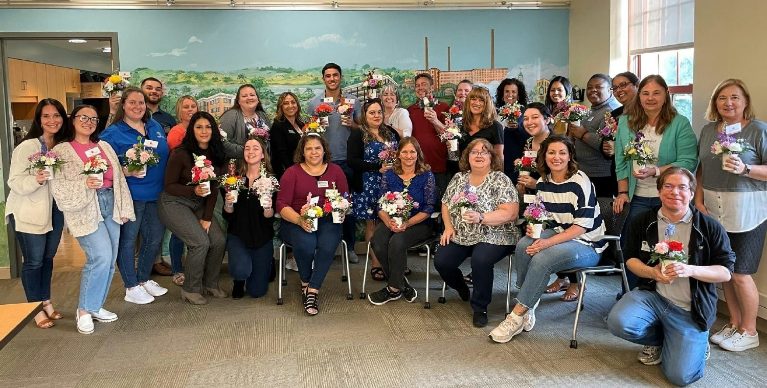 Partnering with the local non-profit Power of Flowers making bouquets for seniors and veterans. 