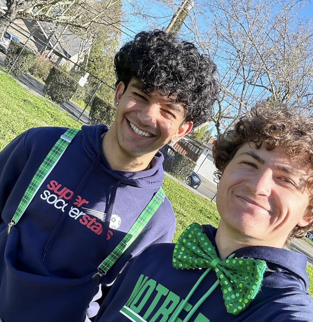 Coaches Ashton and Mateen snapping a selfie for St. Patrick's Day before classes start at Moraga Commons! 