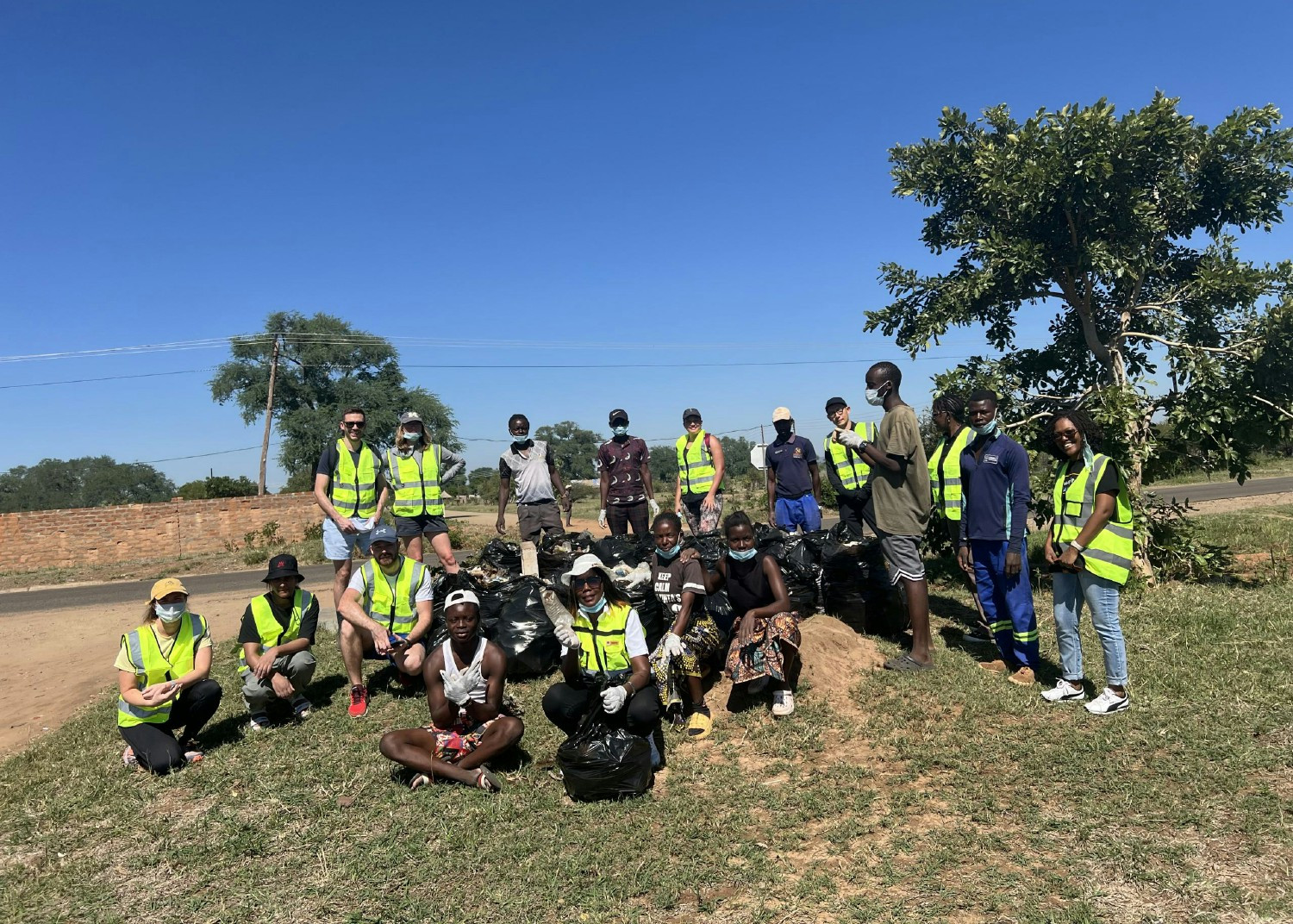 VeraSafe team members clean up a children's sports field and give back to the community.