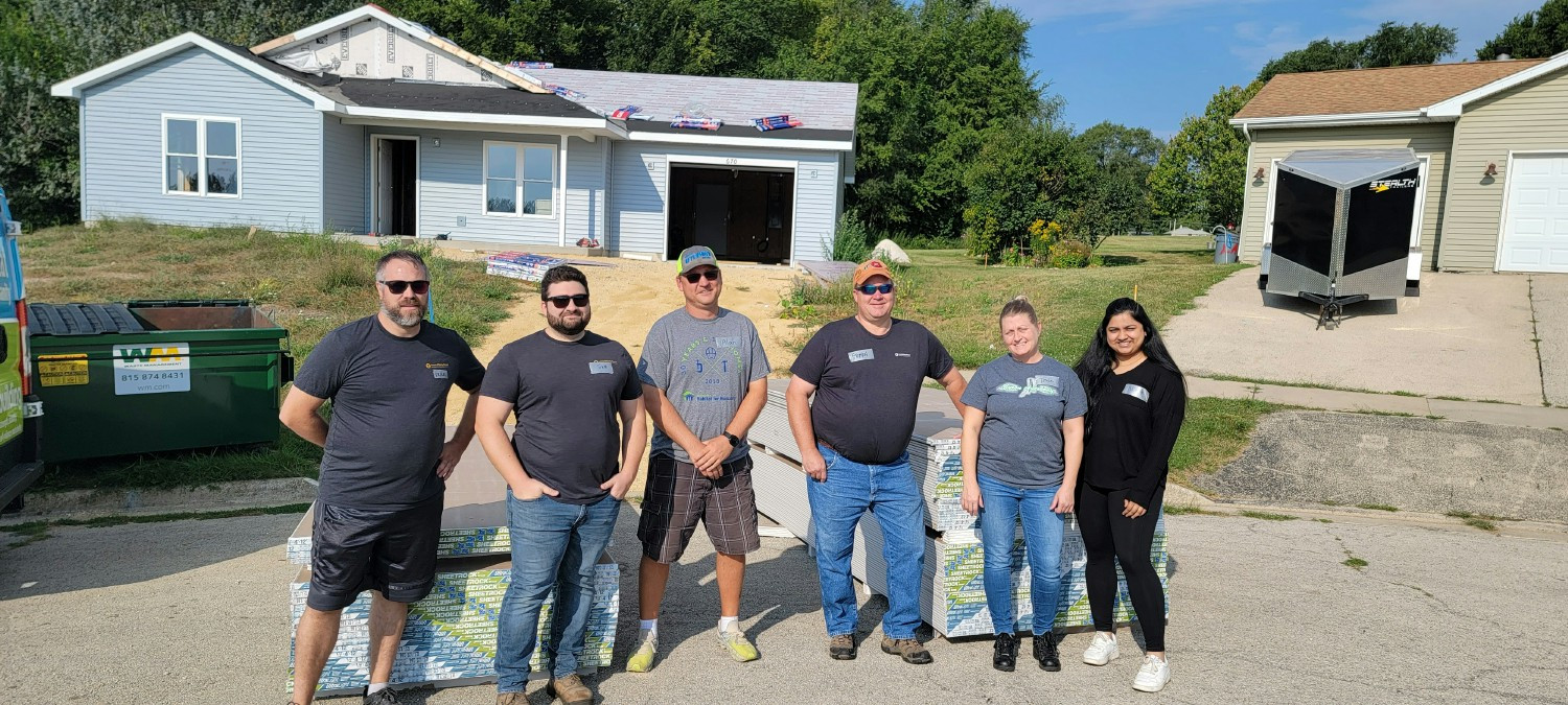 One of several crews working on Habitat for Humanity homes.