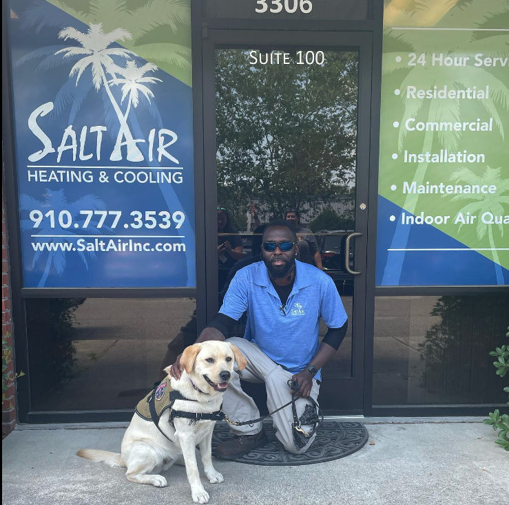 Sky on another visit, pictured here with Doug a Lead Technician here at Salt Air, Inc. 