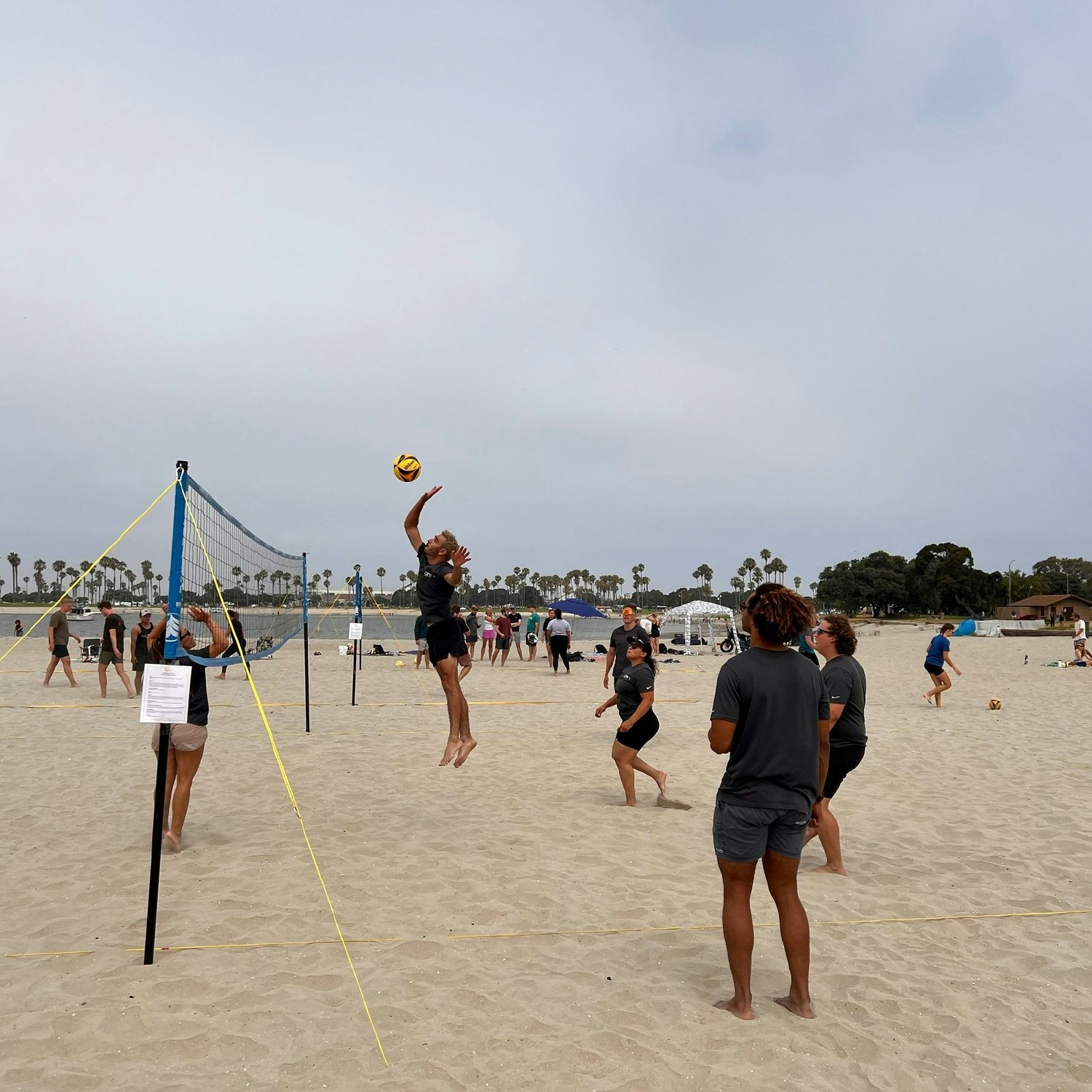 Our volleyball team having a blast at the CalCPA beach tournament!