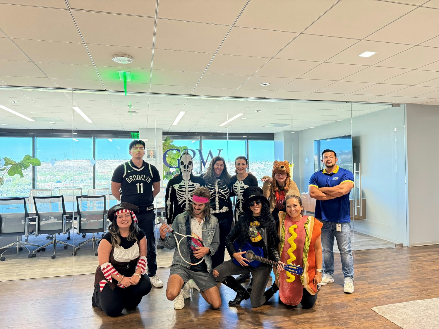 Some of our GPW team showing off their Halloween costumes this year.