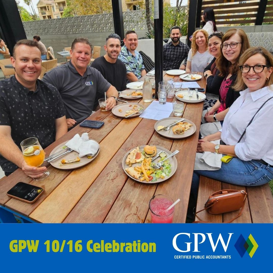 GPW team members celebrating together at our 10/15 deadline party!