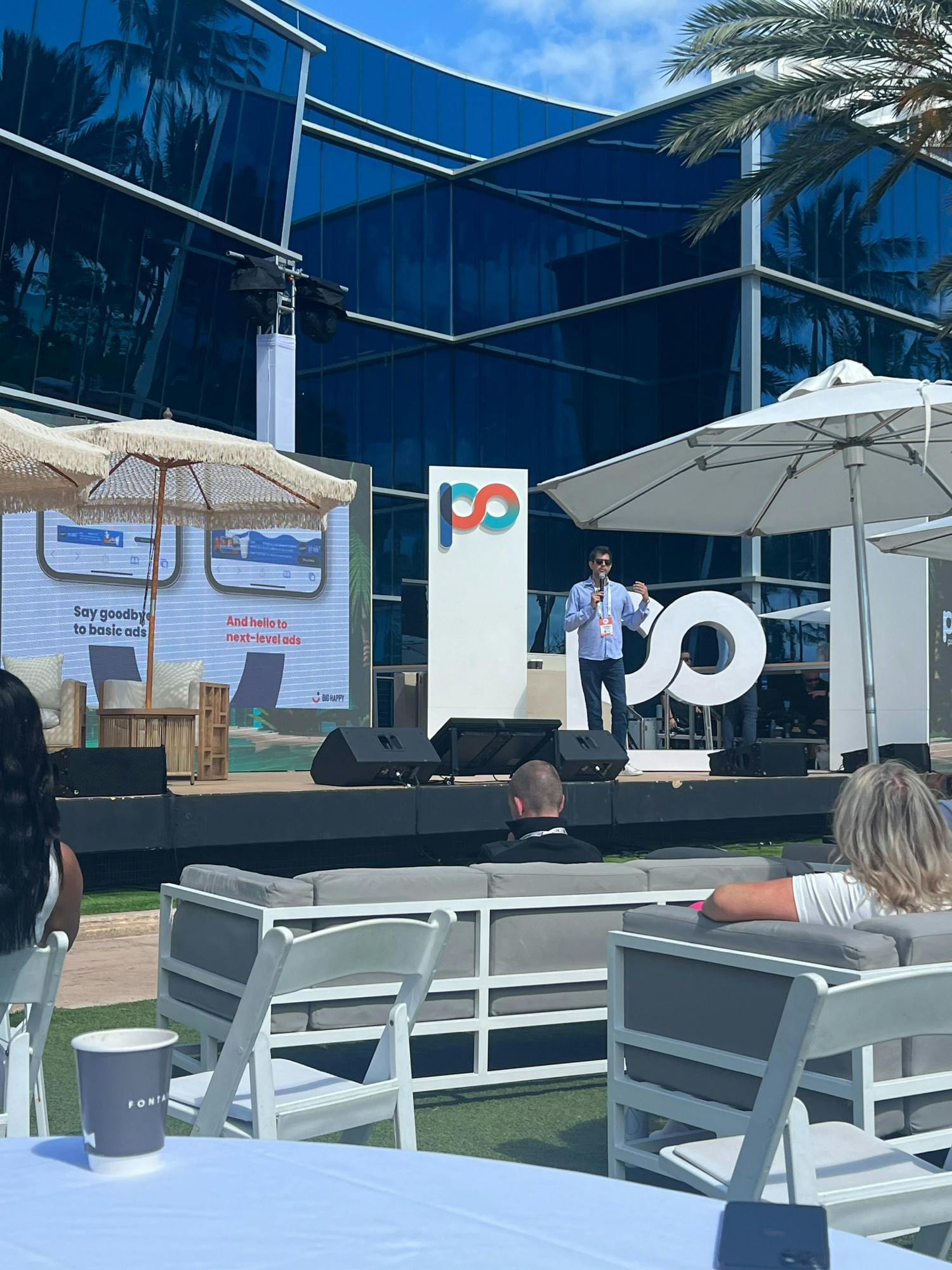 Big Happy CEO Jonathan Frohlinger on the main stage for the Miami Possible event