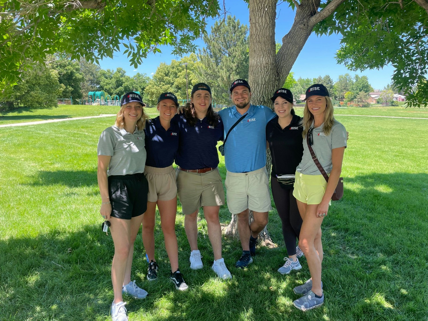 Our marketing team meets at a park for meeting with homeowners