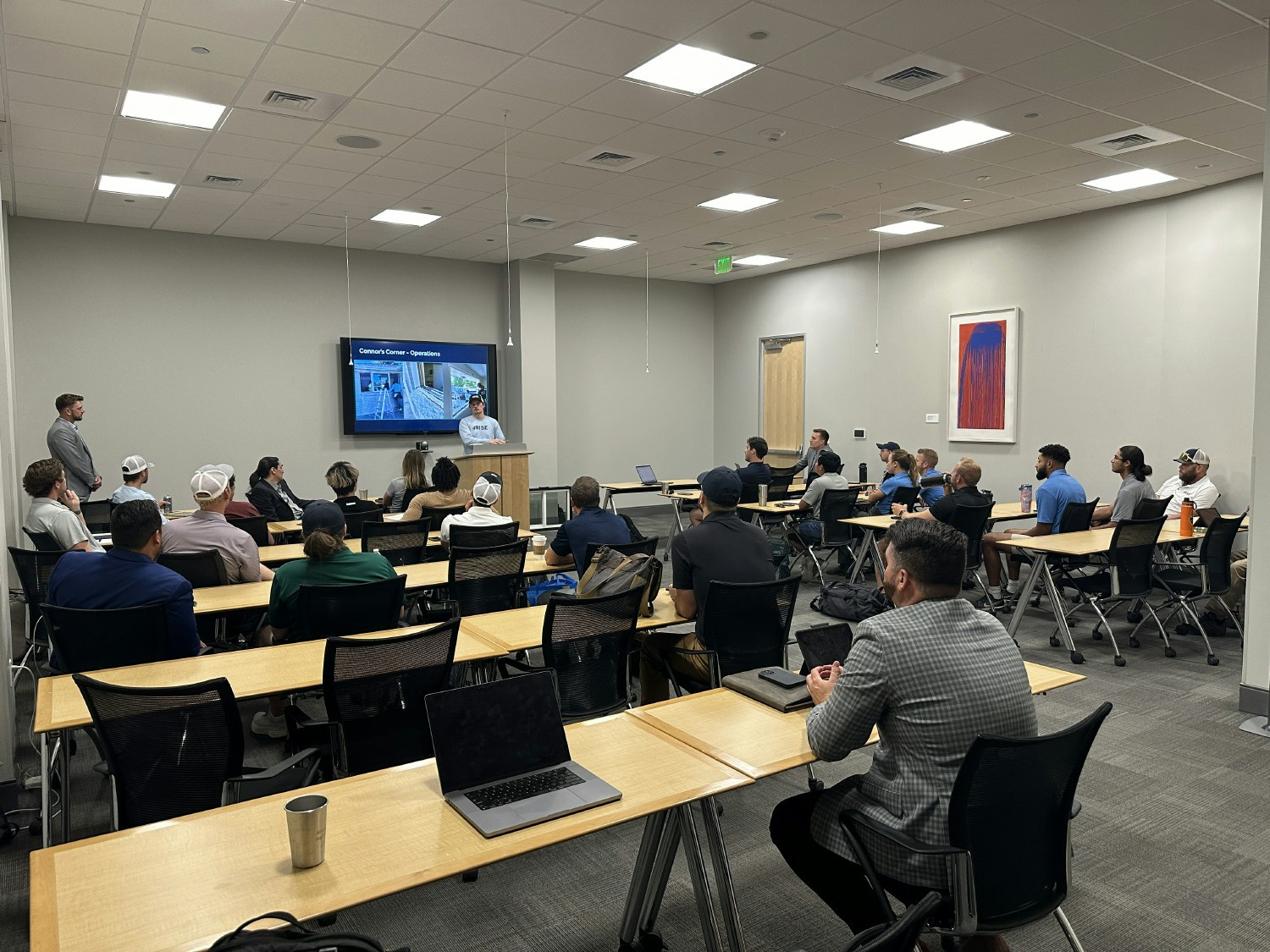 This is our weekly All Hands meeting in the office.