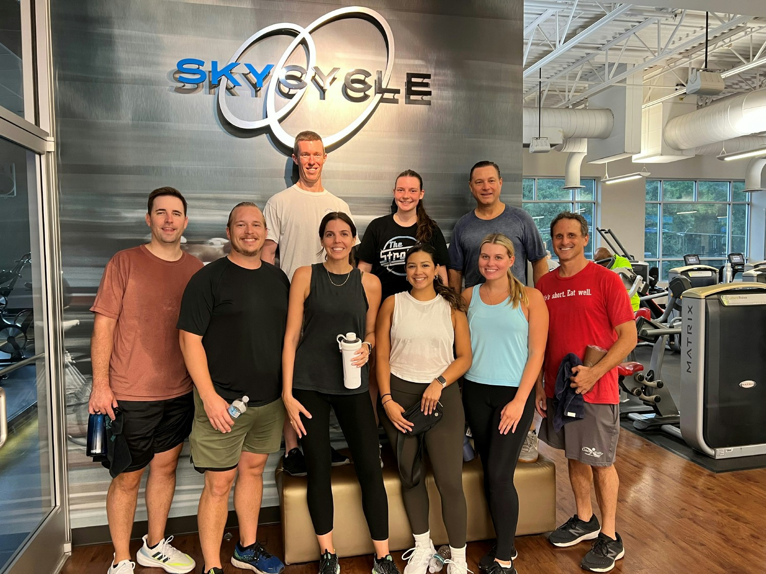 A few of our team members participating in a group cycling class after work.