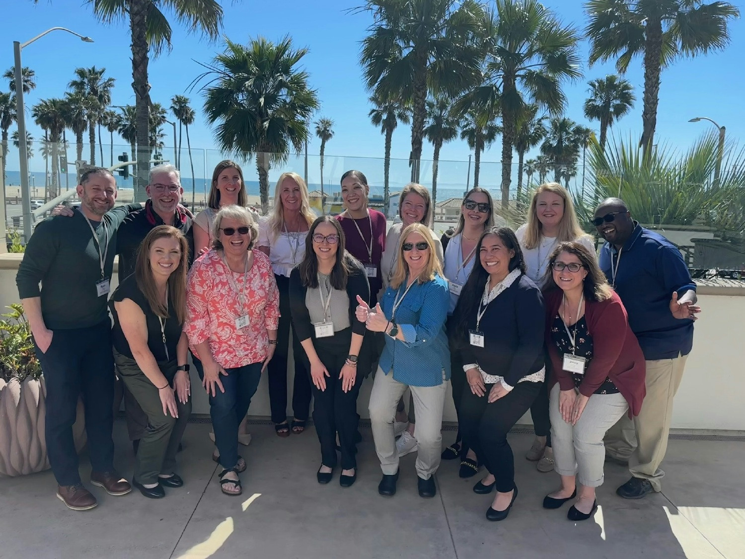 PRO Teams Stronger together! Team building by the beach, fostering collaboration, and resilience.