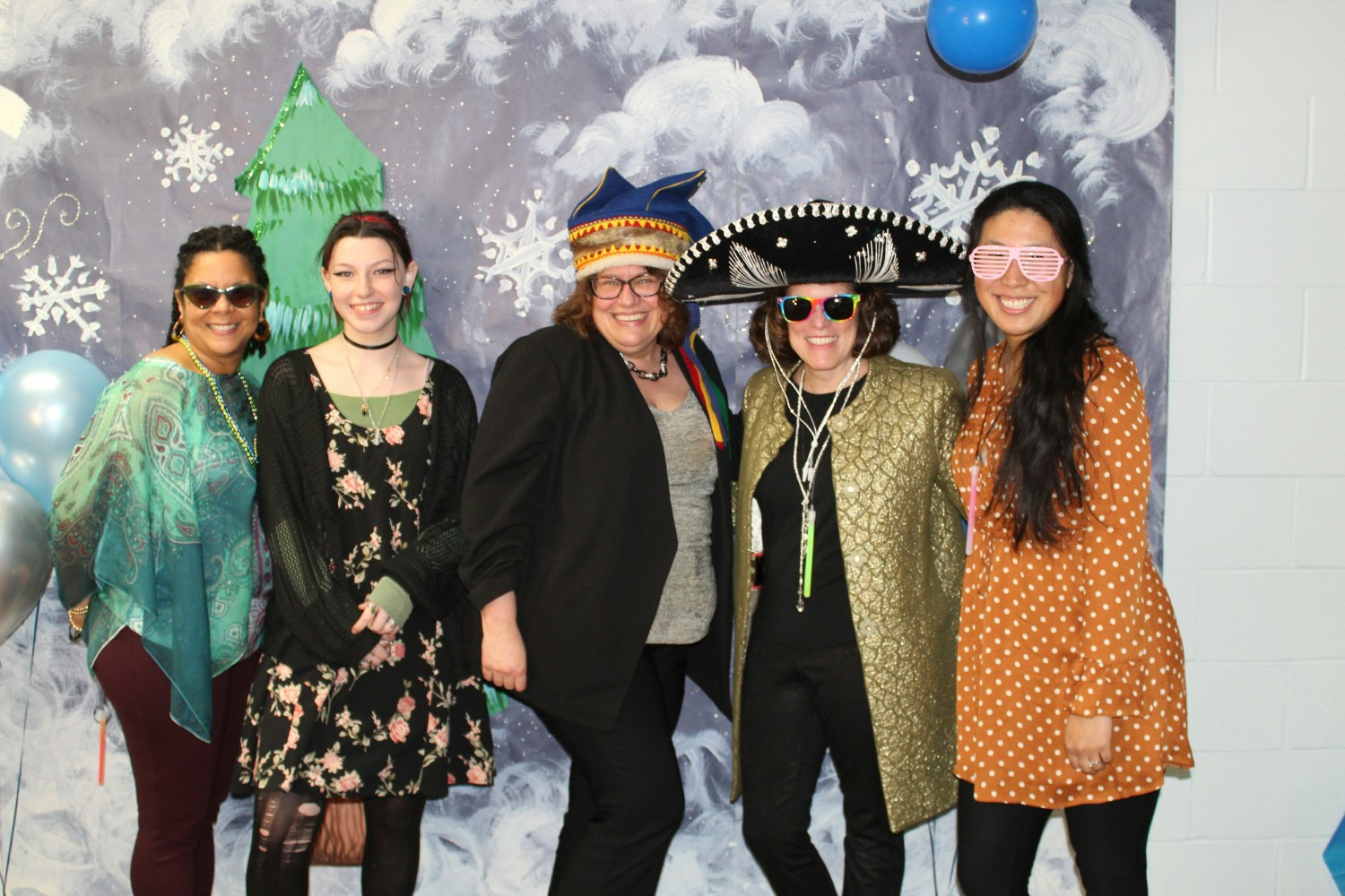 Abilities First staff at a winter dance and activity night for Therapy patients.