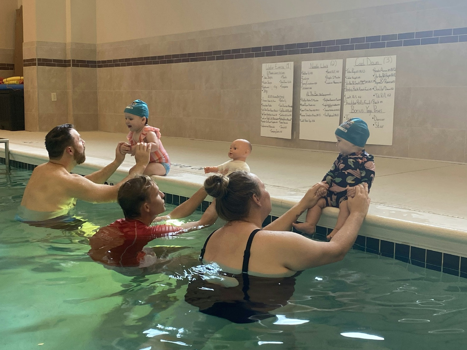 Mr. Jaxon helping teach our parents and babies how to safely enter the water