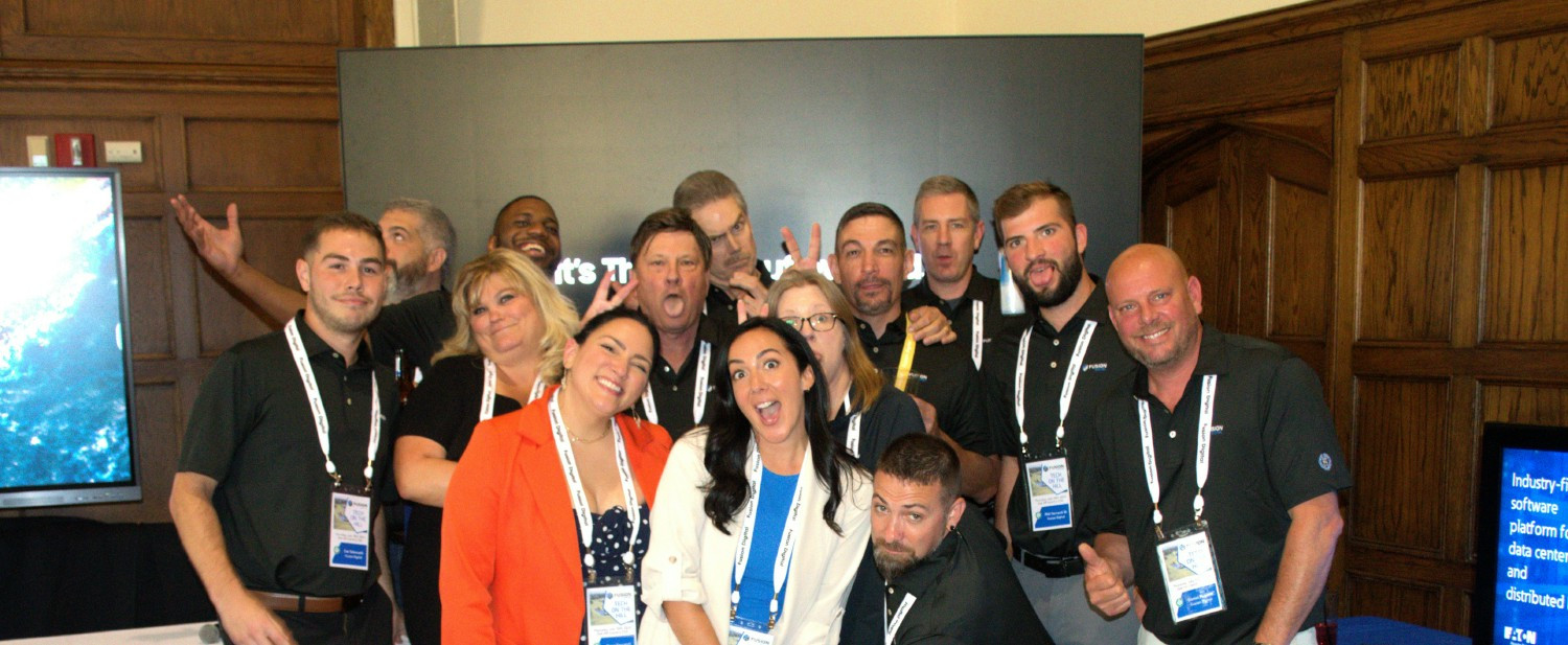 Our staff celebrates a successful technology event with 20 vendors and 150 customers—silly faces and great memories!