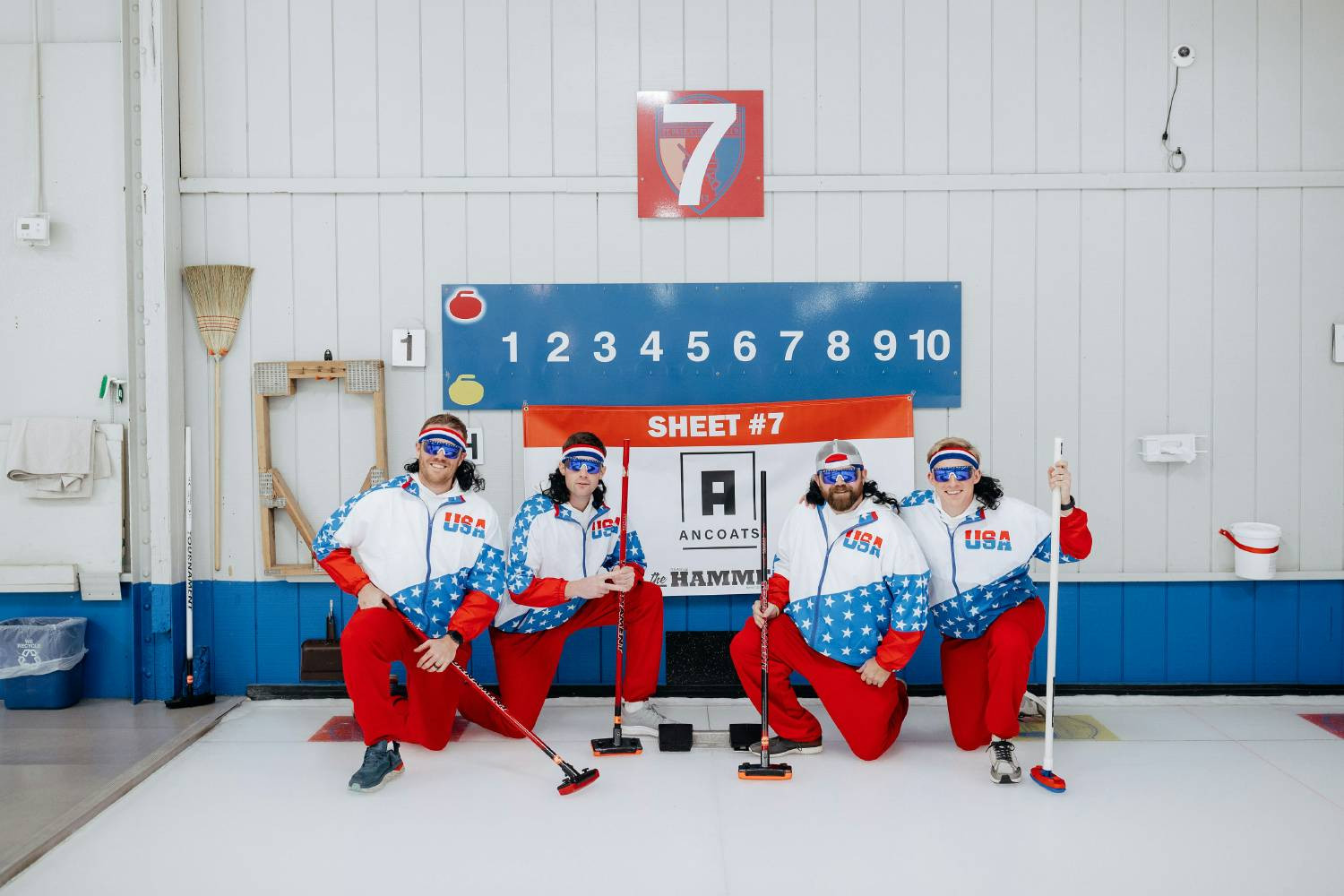 Ancoats curling at a fundraising event, highlighting our commitment to serving the community and having fun doing it!