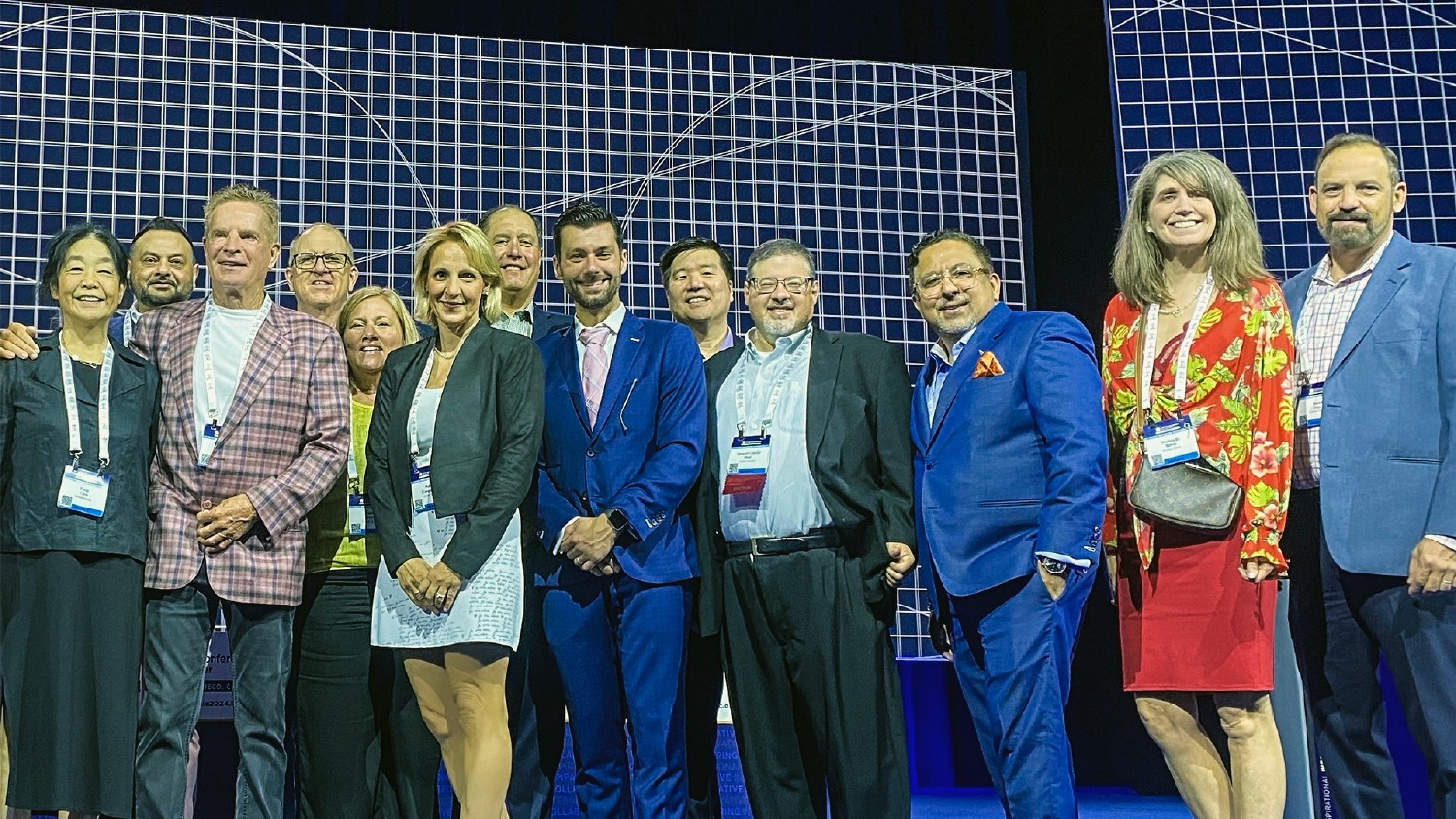 Summit leadership team and presenters on stage at WCLC 2024