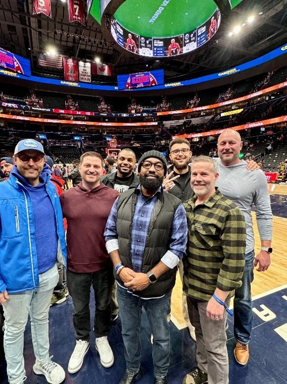 OneZero team members enjoying a night of Washington Wizards basketball